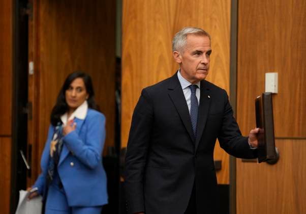 July 30, 2025, Ottawa, On, Canada: Prime Minister Mark Carney makes his way to the stage with Foriegn Affaire Minister Anita Anand for a news conference in Ottawa, Wednesday, July 30, 2025. Ottawa Canada  - ZUMAc35_ 20250730_zaf_c35_110 Copyright: xAdrianxWyldx