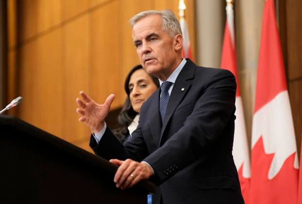 July 30, 2025, Ottawa, On, Canada: Prime Minister Mark Carney speaks with media during a news conference in Ottawa, Wednesday, July 30, 2025. Ottawa Canada  - ZUMAc35_ 20250730_zaf_c35_113 Copyright: xAdrianxWyldx