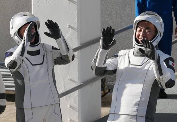 NASA s SpaceX Crew-11 members NASA commander Zena Cardman and mission specialist Kimiya Yui from JAXA (Japan Aerospace Exploration Agency) (L to R) wave as they walk out of the operations center before boarding a SpaceX Falcon 9 rocket at Kennedy Space Center, Florida on Thursday, July 31, 2025. The team will be joined by NASA pilot Mike Fincke and mission specialist Oleg Platonov of Roscosmos as they launch to the International Space Center at 12:09 PM EDT (16:09 UTC) on July 31, 2025.  KSP20250731913 PATxBENIC