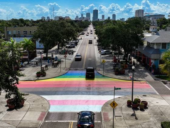 July 31, 2025, St. Petersburg, Florida, USA: An aerial drone view of the Rainbow Progress Pride crosswalk mural at the intersection of 25th Street and Central Avenue with the St. Petersburg city skyline on the horizon in the background on Thursday, July 31, 2025 in St. Petersburg. State and federal transportation authorities are ordering cities to get rid of crosswalk murals citing safety issues. Local groups like St. Pete Pride, which helped raise money for the rainbow crosswalk at 25th and Central, say the move is political. St. Petersburg USA - ZUMAs70_ 20250731_zan_s70_107 Copyright: xDirkxShaddx
