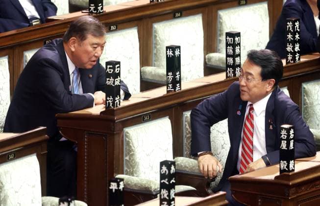 August 1, 2025, Tokyo, Japan - Japanese Prime Minister Shigeru Ishiba (L) chats with Economic Revitalization Minister Ryosei Akazawa (R ) before starting Lower House s plenary session at the National Diet in Tokyo on Friday, August 1, 2025. (photo by Yoshio Tsunoda AFLO)  aflo_299157854
