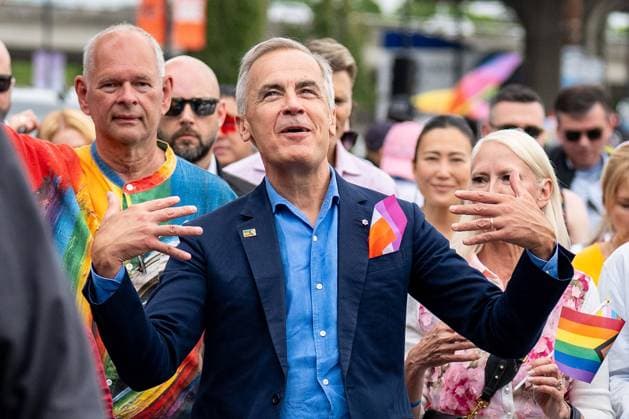 August 3, 2025, Vancouver, Bc, CANADA: Prime Minister Mark Carney fans himself while he marches in the Vancouver Pride Parade in Vancouver, on Sunday, August 3, 2025. Vancouver CANADA  - ZUMAc35_ 20250803_zaf_c35_076 Copyright: xEthanxCairnsx