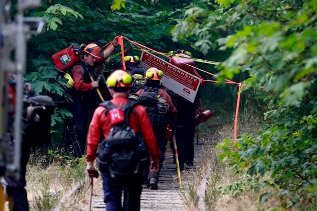 August 3, 2025, Coombs, Bc, CAN: Crews members prepare to battle the Wesley Ridge wildfire on the north side of Cameron Lake off Highway 4 near Coombs, B.C., on Sunday, August 3, 2025. Coombs CAN  - ZUMAc35_ 20250803_zaf_c35_117 Copyright: xChadxHipolitox