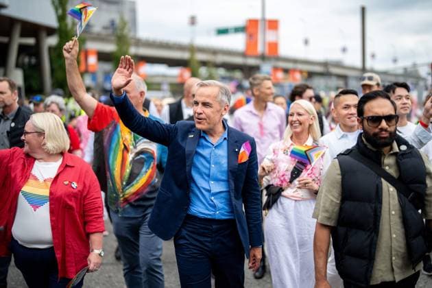 August 3, 2025, Vancouver, Bc, CANADA: Prime Minister Mark Carney waves while he marches in the Vancouver Pride Parade in Vancouver, on Sunday, August 3, 2025. Vancouver CANADA  - ZUMAc35_ 20250803_zaf_c35_136 Copyright: xEthanxCairnsx