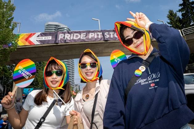 August 3, 2025, Vancouver, Bc, CANADA: People pose for a photo while dressed in pride attire during the Vancouver Pride Parade in Vancouver, B.C., Sunday, Aug. 3, 2025. Vancouver CANADA  - ZUMAc35_ 20250803_zaf_c35_153 Copyright: xEthanxCairnsx
