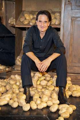 abb Oliver Mommsen actor leading actor sits mountain potatoes on the occasion of the German premiere of the play Vanja by the Komoedie am Kurfuerstendamm at the Neues Haus of the Berliner Ensemble on August 03, 2025 in Berlin Berlin Germany