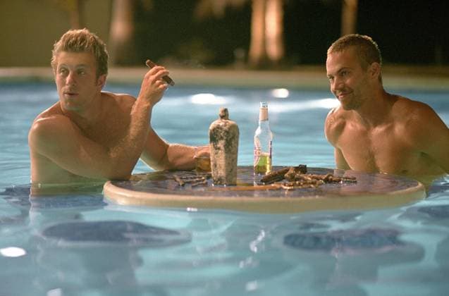 2005 - Into the Blue - Movie Set RELEASE DATE: September 30, 2005. MOVIE TITLE: Into the Blue. STUDIO: Columbia Pictures. PLOT: A group of divers find themselves in deep trouble with a drug lord after they come upon the illicit cargo of a sunken airplane. PICTURED: SCOTT CAAN as Bryce and PAUL WALKER as Jared. Bahamas Copyright: xColumbiaxPicturesx