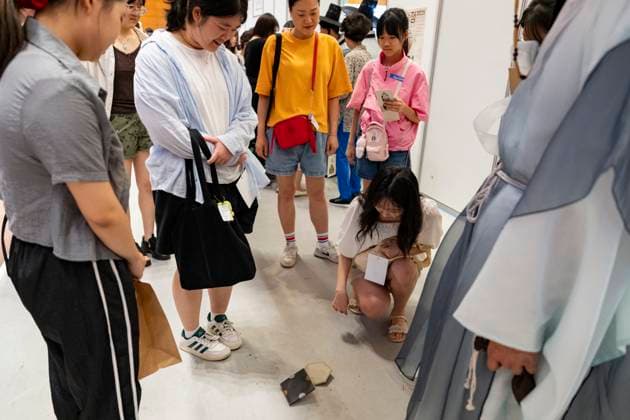 Visitors Attend 2025 Hanbok Expo At COEX In Seoul Attendees play ttakji, a traditional Korean paper-slap game, during the 2025 Hanbok Expo at COEX in Gangnam District, Seoul, South Korea, on August 7, 2025. Now in its eighth year, the country s only hanbok-focused expo is hosted by the Ministry of Culture, Sports and Tourism and organized by the Korea Craft & Design Foundation, with participation from 150 companies at home and abroad. The event runs through August 10. Seoul Seoul South Korea  Copyright: xChrisxJungx originalFilename: jung-visitors250807_np9I9.jpg