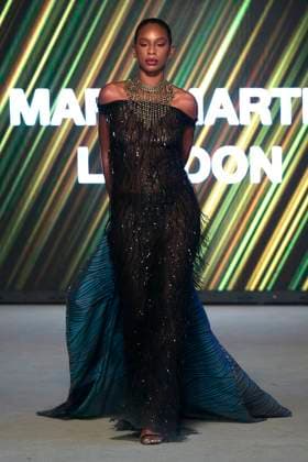 Africa Fashion Week London 2025 A model walks the catwalk in the Mary Martin London show during Africa Fashion Week, London, UK, 09 August 2025. Africa Fashion Week London is celebrating its 15th anniversary as the world™s largest and longest-running showcase of African and African-inspired fashion. AFWL 2025 emphasizes ˜Heritage in Motion™ melding tradition with innovation., Credit:Olu Ogunshakin Avalon United Kingdom, London, London, 1 Kemble Street, WC2B 4AN  Copyright: xOluxOgunshakinx xAvalonx 1028645101