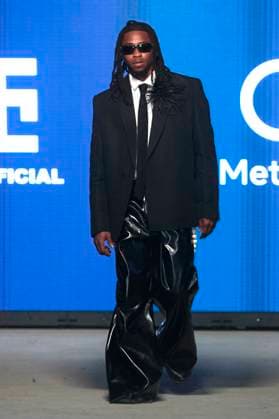 Africa Fashion Week London 2025 A model walks the catwalk in the I.N Official in collaboration with Meta AI show during Africa Fashion Week, London, UK, 09 August 2025. Africa Fashion Week London is celebrating its 15th anniversary as the world™s largest and longest-running showcase of African and African-inspired fashion. AFWL 2025 emphasizes ˜Heritage in Motion™ melding tradition with innovation., Credit:Olu Ogunshakin Avalon United Kingdom, London, London, 1 Kemble Street, WC2B 4AN  Copyright: xOluxOgunshakinx xAvalonx 1028704477