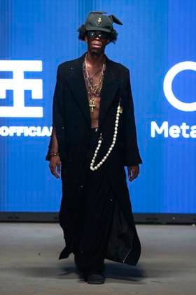 Africa Fashion Week London 2025 A model walks the catwalk in the I.N Official in collaboration with Meta AI show during Africa Fashion Week, London, UK, 09 August 2025. Africa Fashion Week London is celebrating its 15th anniversary as the world™s largest and longest-running showcase of African and African-inspired fashion. AFWL 2025 emphasizes ˜Heritage in Motion™ melding tradition with innovation., Credit:Olu Ogunshakin Avalon United Kingdom, London, London, 1 Kemble Street, WC2B 4AN  Copyright: xOluxOgunshakinx xAvalonx 1028704479