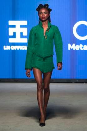 Africa Fashion Week London 2025 A model walks the catwalk in the I.N Official in collaboration with Meta AI show during Africa Fashion Week, London, UK, 09 August 2025. Africa Fashion Week London is celebrating its 15th anniversary as the world™s largest and longest-running showcase of African and African-inspired fashion. AFWL 2025 emphasizes ˜Heritage in Motion™ melding tradition with innovation., Credit:Olu Ogunshakin Avalon United Kingdom, London, London, 1 Kemble Street, WC2B 4AN  Copyright: xOluxOgunshakinx xAvalonx 1028704510
