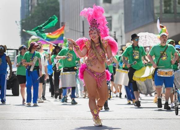 August 10, 2025, Montreal, Pq, Canada: A participant blows a kiss to the crowd during the Pride parade in Montreal, Sunday, August 10, 2025. Montreal Canada  - ZUMAc35_ 20250810_zaf_c35_007 Copyright: xGrahamxHughesx