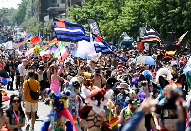 August 10, 2025, Montreal, Pq, Canada: Participants waves flags during the Pride parade in Montreal, Sunday, August 10, 2025. Montreal Canada  - ZUMAc35_ 20250810_zaf_c35_011 Copyright: xGrahamxHughesx