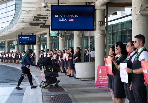 August 11, 2025, Toronto, On, CANADA: Air Canada flight attendants gather for a demonstration in preparation for a possible strike at Pearson International Airport in Toronto, on Monday, Aug. 11, 2025. Toronto CANADA  - ZUMAc35_ 20250811_zaf_c35_012 Copyright: xNathanxDenettex