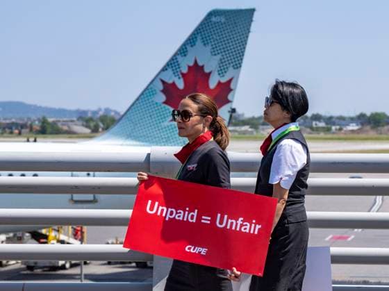 August 11, 2025, Montreal, Pq, CANADA: Air Canada flight attendants hold a silent protest at Montreal-Pierre Elliott Trudeau International Airport in Montreal, on Monday, Aug. 11, 2025. Montreal CANADA  - ZUMAc35_ 20250811_zaf_c35_021 Copyright: xChristinnexMuschix