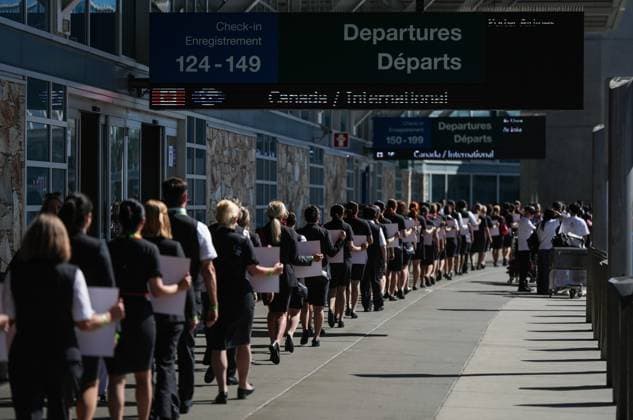 August 11, 2025, Richmond, Bc, CANADA: Air Canada flight attendants march together as they leave after holding a silent protest at Vancouver International Airport on a national day of action, as labour negotiations between the Canadian Union of Public Employees and the airline continue, in Richmond, B.C., on Monday, Aug. 11, 2025. Richmond CANADA - ZUMAc35_ 20250811_zaf_c35_036 Copyright: xDarrylxDyckx
