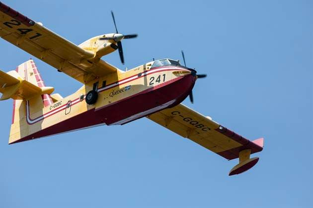 August 11, 2025, Shediac Bridge, Nb, Canada: A Quebec Water Bomber help fight a forest fire in the Irishtown, N.B. area on Monday August 11, 2025. Shediac Bridge Canada  - ZUMAc35_ 20250811_zaf_c35_054 Copyright: xRonxWardx