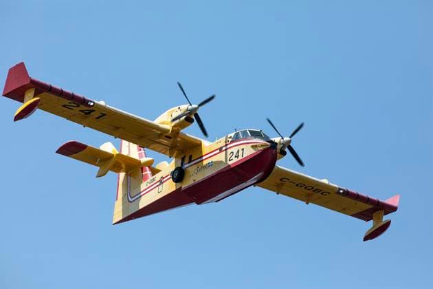 August 11, 2025, Shediac Bridge, Nb, Canada: A Quebec Water Bomber help fight a forest fire in the Irishtown, N.B. area on Monday August 11, 2025. Shediac Bridge Canada  - ZUMAc35_ 20250811_zaf_c35_065 Copyright: xRonxWardx