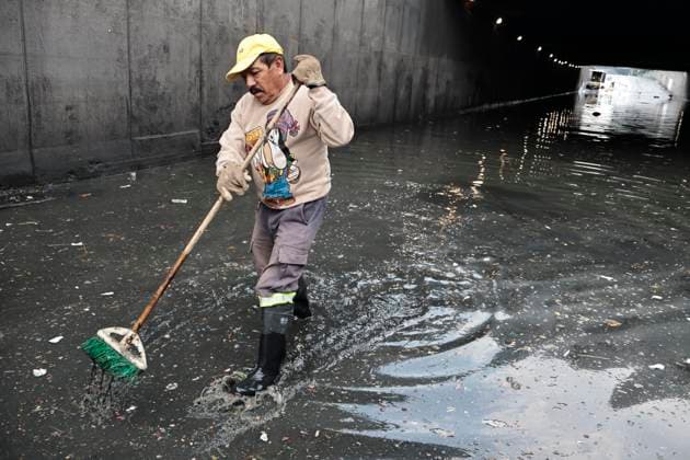 August 11, 2025, Mexico, Cdmx, Mexico: In the Venustiano Carranza region, very close to Mexico City International Airport (AICM), flooding occurred due to recent heavy rains. The vehicles transported to the airport were affected, especially under bridges, where rainwater and sewage from the sewers covered some cars, preventing their owners from getting them out in time. Mexico City sanitation and water workers are working constantly using machinery to remove water from these tunnels and unclog the sewers to remove vehicles that have been totally lost. Mexico Mexico - ZUMAp204 20250811_zip_p204_051 Copyright: xJosuexPerezx