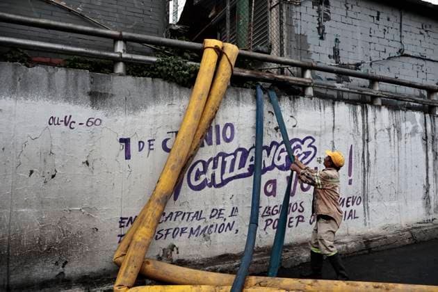 August 11, 2025, Mexico, Cdmx, Mexico: In the Venustiano Carranza region, very close to Mexico City International Airport (AICM), flooding occurred due to recent heavy rains. The vehicles transported to the airport were affected, especially under bridges, where rainwater and sewage from the sewers covered some cars, preventing their owners from getting them out in time. Mexico City sanitation and water workers are working constantly using machinery to remove water from these tunnels and unclog the sewers to remove vehicles that have been totally lost. Mexico Mexico - ZUMAp204 20250811_zip_p204_062 Copyright: xJosuexPerezx