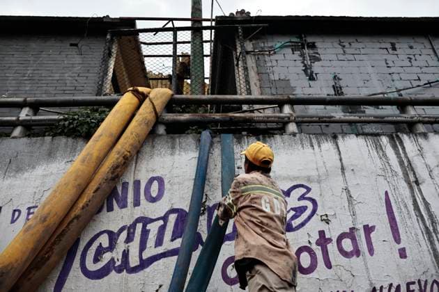 August 11, 2025, Mexico, Cdmx, Mexico: In the Venustiano Carranza region, very close to Mexico City International Airport (AICM), flooding occurred due to recent heavy rains. The vehicles transported to the airport were affected, especially under bridges, where rainwater and sewage from the sewers covered some cars, preventing their owners from getting them out in time. Mexico City sanitation and water workers are working constantly using machinery to remove water from these tunnels and unclog the sewers to remove vehicles that have been totally lost. Mexico Mexico - ZUMAp204 20250811_zip_p204_064 Copyright: xJosuexPerezx