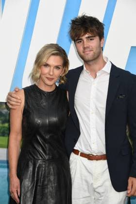 HOLLYWOOD, CA - AUGUST 11: Rhea Seehorn and Graham Franklin ˜Gray™ Larson at the premiere of Universal Pictures ˜Nobody 2 at TCL Chinese Theatre on August 11, 2025 in Hollywood, California. Copyright: xJeffreyxMayerx