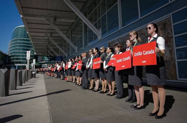 250811 -- VANCOUVER, Aug. 11, 2025 -- Air Canada flight attendants stand in a silent protest at Vancouver International Airport during a national day of action in Richmond, British Columbia, Canada, on Aug. 11, 2025. Photo by Xinhua CANADA-VANCOUVER-FLIGHT ATTENDANTS-PROTEST LiangxSen  CANADA-VANCOUVER-FLIGHT ATTENDANTS-PROTEST IMAGO LiangxSen  imago images 1065045546