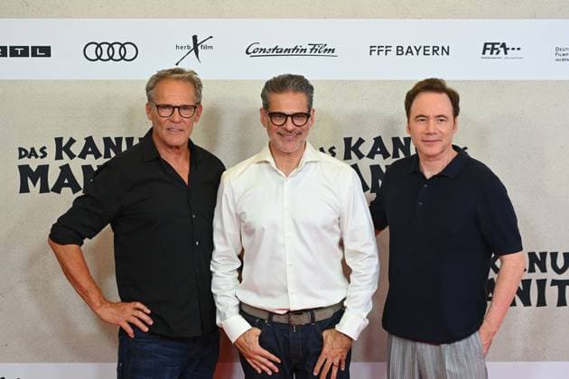 from left Christian TRAMITZ actor , Rick KAVANIAN,Michael Bully HERBIG director,producer,author , movie premiere DAS KANU DES MANITU on 12 08 2025 at the Mathaeser Kino in Munich