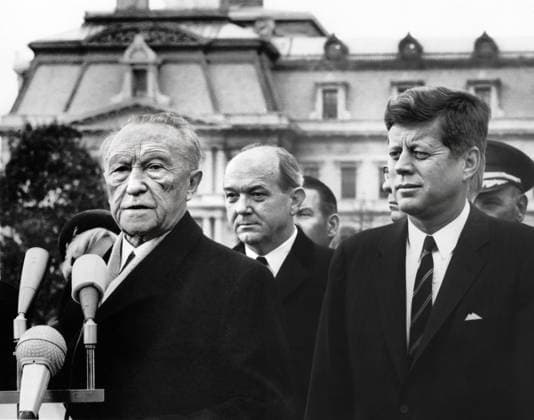 June 30, 2025, Washington, Dc, USA: U.S. President John F. Kennedy looking on as Chancellor of West Germany, Dr. Konrad Adenauer, delivers remarks during arrival ceremonies in his honor with U.S. Secretary of State, Dean Rusk, standing in center, South Lawn, White House, Washington, D.C., USA, Abbie Rowe, White House Photographs, November 14, 1962 Washington USA - ZUMAg145 20250630_zap_g145_023 Copyright: xJTxVintagex