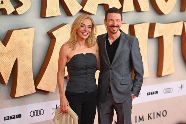 Oliver BERBEN with Inga LESCHEK Chief Content Officer RTL Germany , movie premiere DAS KANU DES MANITU on 12 08 2025 at Mathaeser Kino in Munich