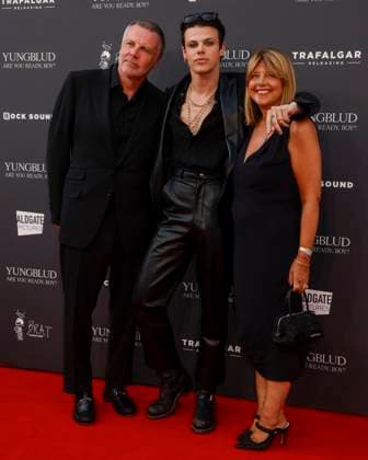 August 12, 2025, London, United Kingdom: Justin Harrison, YUNGBLUD aka Dominic Richard Harrison and Samantha Harrison attend the YUNGBLUD. Are You Ready, Boy? Premiere at the Vue in Leicester Square. London United Kingdom - ZUMAs197 20250812_aaa_s197_454 Copyright: xCatxMorleyx