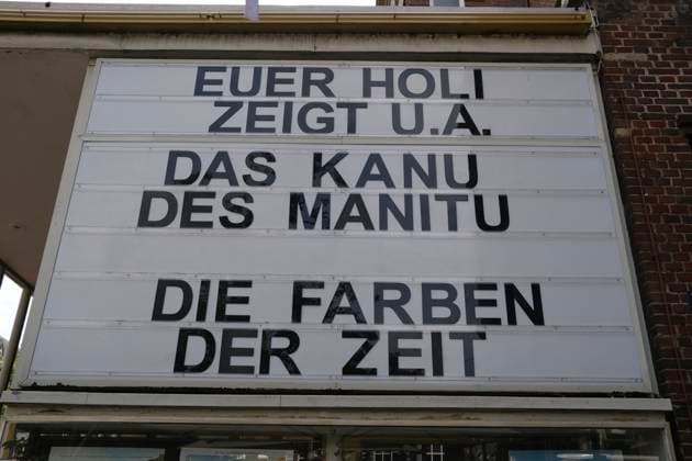 The Canoe of Manitou Letters on the blackboard of a cinema announce new movie releases The films The Canoe of Manitou and The Colors of Time are shown Hamburg RECORD DATE NOT STATED