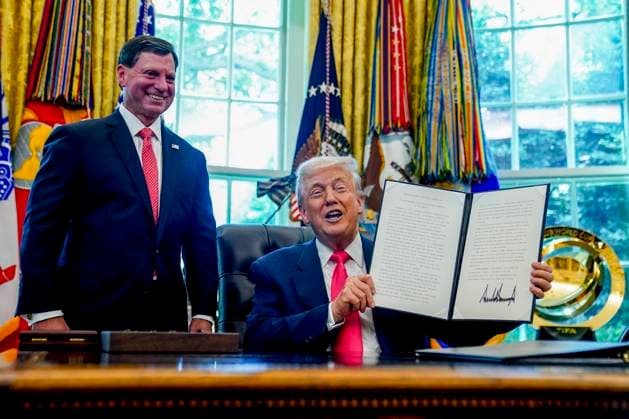 President Donald Trump, with commissioner of the Social Security Administration Frank Bisignano, shows the signed proclamation marking the 90th anniversary of the Social Security Act in the Oval Office at the White House on Thursday, August 14, 2025 in Washington, DC. Trump delivered remarks and responded to questions on his presidential proclamation marking the 90th anniversary of the Social Security Act, the federal crime crackdown in DC, and his trip to Anchorage to meet with Russian President Vladimir Putin.  WASP20250814161 WILLxOLIVER