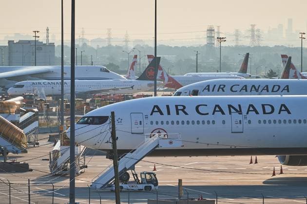 August 16, 2025, Toronto, On, Canada: Air Canada planes sit on the runway at Pearson International Airport as flight attendants go on strike in Toronto on Saturday, Aug. 16, 2025. Toronto Canada  - ZUMAc35_ 20250816_zaf_c35_013 Copyright: xSammyxKoganx