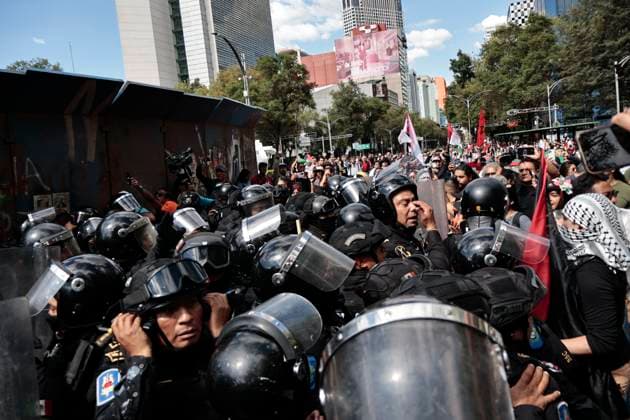 August 17, 2025, Mexico, Cdmx, Mexico: Hundreds of activists and pro-Palestine activists gathered at the Angel of Independence to demand a ceasefire, a ceasefire, and the attempted occupation by the State of Israel against the State of Palestine. The protesters marched along Paseo de la Reforma Avenue, where they were approached by Mexico City police officers. There were some attacks by police officers during the peaceful protest. All the contingents arrived at the JuoÂ¡rez Hemicycle, where they held a small sit-in in front of the new Anti-Palestine Monument in support of all the murders of civilians and journalists committed by BENJAMIN NETANYAHU. Mexico Mexico - ZUMAp204 20250817_zip_p204_040 Copyright: xJosuexPerezx