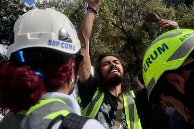 August 17, 2025, Mexico, Cdmx, Mexico: Hundreds of activists and pro-Palestine activists gathered at the Angel of Independence to demand a ceasefire, a ceasefire, and the attempted occupation by the State of Israel against the State of Palestine. The protesters marched along Paseo de la Reforma Avenue, where they were approached by Mexico City police officers. There were some attacks by police officers during the peaceful protest. All the contingents arrived at the JuoÂ¡rez Hemicycle, where they held a small sit-in in front of the new Anti-Palestine Monument in support of all the murders of civilians and journalists committed by BENJAMIN NETANYAHU. Mexico Mexico - ZUMAp204 20250817_zip_p204_046 Copyright: xJosuexPerezx