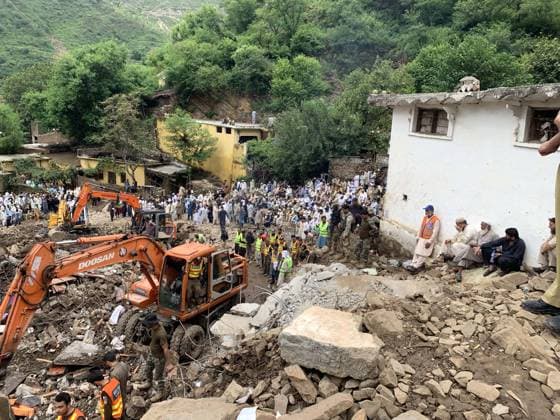 (250819) -- SWABI, Aug. 19, 2025 -- Residents watch as relief personnel search through the rubble of collapsed houses for victims during a rescue operation, a day after a cloudburst in Swabi district of northwest Pakistan s Khyber Pakhtunkhwa province on Aug. 19, 2025. A total of 46 people have been killed in monsoon rains during the last 24 hours, raising the death toll of rain-related deaths to 393 in Pakistan since Thursday, the country s National Disaster Management Authority (NDMA) said on Tuesday. In total, 706 Pakistanis have died since the onset of the monsoon season on June 26, the authority said in its latest situation report. (Str Xinhua) (SpotNews) PAKISTAN-SWABI-CLOUDBURST-AFTERMATH AhmadxKamal 