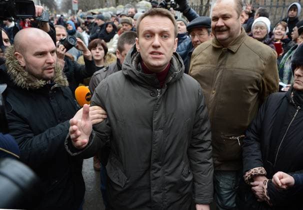Russian opposition leader Alexei Navalny MOSCOW, RUSSIA - (ARCHIVE): A file photo dated February 24, 2014 shows the Russian opposition leader and lawyer Alexei Navalny (C) cannot enter the court building because of the police barricade in Moscow, Russia. The trial is about the protest at least 80 wounded and 400 custody that was held on the eve of President Vladimir Putin s May 7, 2012 in Moscow, Russia. Moskova Rusya. Editorial use only. Please get in touch for any other usage.  Copyright: x2025xAnadoluxSefaxKaracanx