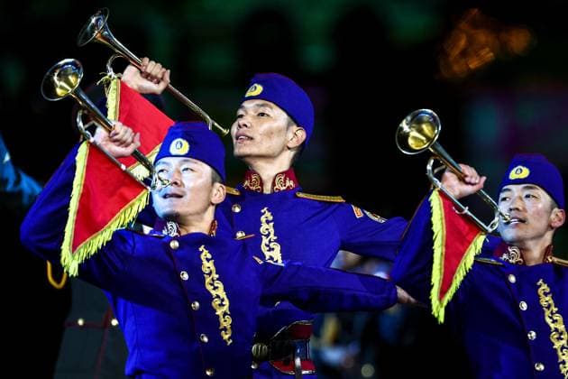 RUSSIA, MOSCOW - AUGUST 22, 2025: The Mongolian Military Song and Dance Academic Ensemble perform during the opening ceremony of the 17th Spasskaya Tower International Military Music Festival in Red Square. Sergei Bulkin TASS  83325535