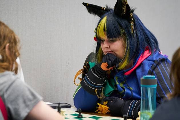 August 22, 2025, Toronto, On, Canada: Convention-goers in cosplay play chess on the second day of the annual Fan Expo convention in Toronto, on Friday, Aug. 22, 2025. Toronto Canada  - ZUMAc35_ 20250822_zaf_c35_141 Copyright: xSammyxKoganx