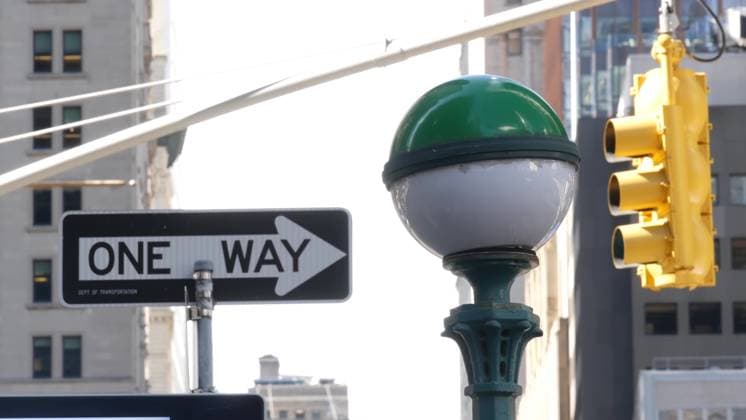 New York City subway entrance globe, orb lamp. Traffic light, Manhattan downtown, underground metro. New York City subway entrance globe, orb lamp. Yellow traffic light, Manhattan downtown road intersection. Street crossroad. Metropolitan underground, United States metro transport. One Way arrow sign, 64207776.jpg RECORD DATE NOT STATED