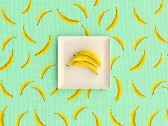 Bananas on plate with banana pattern 3d render on turquoise tablecloth, UWF02151