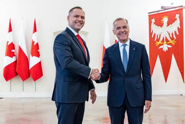 August 25, 2025, Warsaw, POLAND: Prime Minister Mark Carney, right, is welcomed by Polish President Karol Nawrocki at the Presidential Palace in Warsaw, Poland on Monday, Aug. 25, 2025. Warsaw POLAND  - ZUMAc35_ 20250825_zaf_c35_018 Copyright: xChristinnexMuschix
