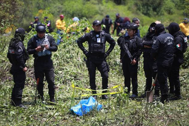 Human remains found during a search operation for missing persons in Mexico STATE OF MEXICO, MEXICO - AUGUST 26: Police officers secure the area where human remains were found during a search operation, at the Sierra de Guadalupe, in the State of Mexico, Mexico on August 26, 2025. Human remains were found in the mountainous area of Sierra de Guadalupe during a search operation carried out by relatives of missing persons, members of the National Guard, collectives and members of the Investigation Police, among others. The number of people reported as disappeared continues to rise in the country, now exceeding 130,000 Daniel Cardenas Anadolu State of Mexico Mexico. Editorial use only. Please get in touch for any other usage. Copyright: x2025xAnadoluxDanielxCardenasx