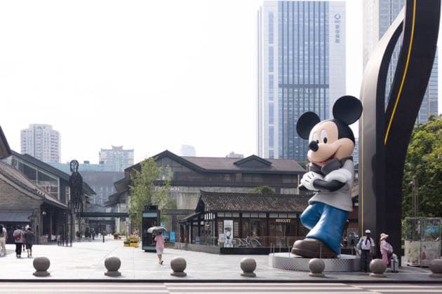 CHENGDU, CHINA - AUGUST 27: A giant Mickey Mouse installation greets visitors at the Taikoo Li shopping mall, where Disney has teamed up with the venue for a month-long event, on August 27, 2025 in Chengdu, Sichuan Province of China.  Copyright: xVCGx 111587405882