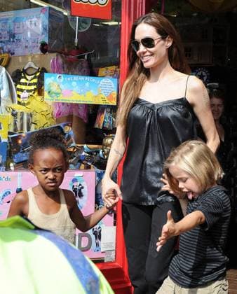 Angelina Jolie and daughters Zahara Jolie-Pitt and Shiloh Nouvel Jolie-Pitt leaving the Toy Station Richmond, Surrey - 15.08.11 WENN 3472147.jpg