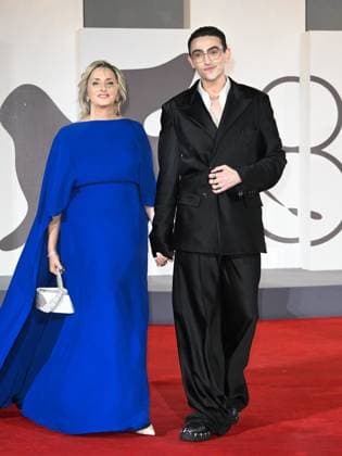 Venice, 82nd Venice International Film Festival 2025 - Evening 2. Red Carpet Film Jay Kelly. Pictured: Michele Bravi with his mother Giovanna Machi.  Copyright: xSimonexComix xipa-agency.netx xPoolxPhotoxEventsx06x IPA_Agency_IPA63497386