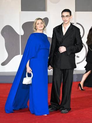 Venice, 82nd Venice International Film Festival 2025 - Evening 2. Red Carpet Film Jay Kelly. Pictured: Michele Bravi with his mother Giovanna Machi.  Copyright: xSimonexComix xipa-agency.netx xPoolxPhotoxEventsx06x IPA_Agency_IPA63497395