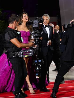 Venice, 82nd Venice International Film Festival 2025 - Evening 2 - Red Carpet for the film Jay Kelly - Pictured: Amal and George Clooney  Copyright: xManuelexMangiarottix xipa-agency.netx xPoolxPhotoxEventsx06x IPA_Agency_IPA63498055